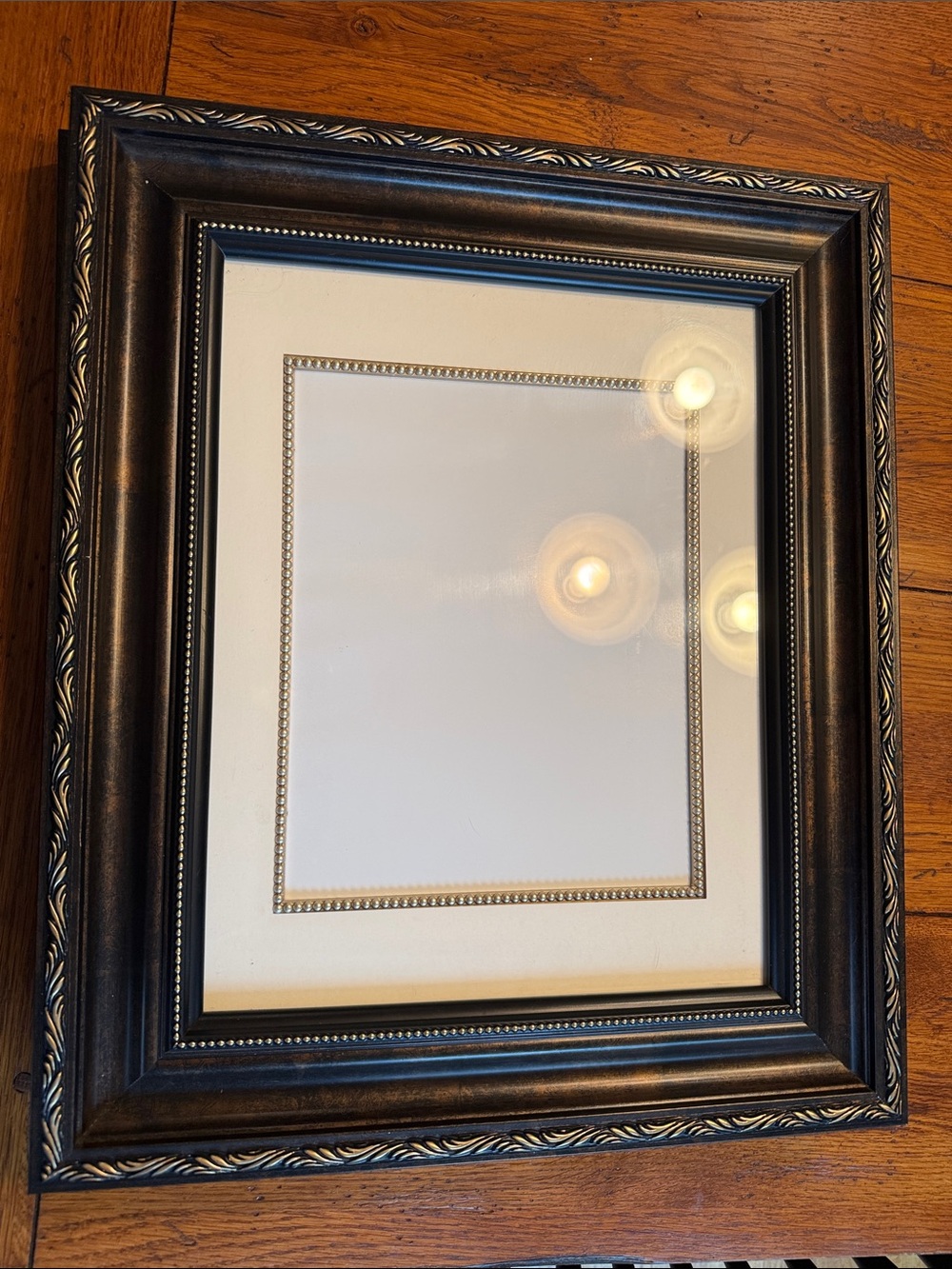 Kirklands Black and Gold Ornate Picture Frame with Ivory Mat